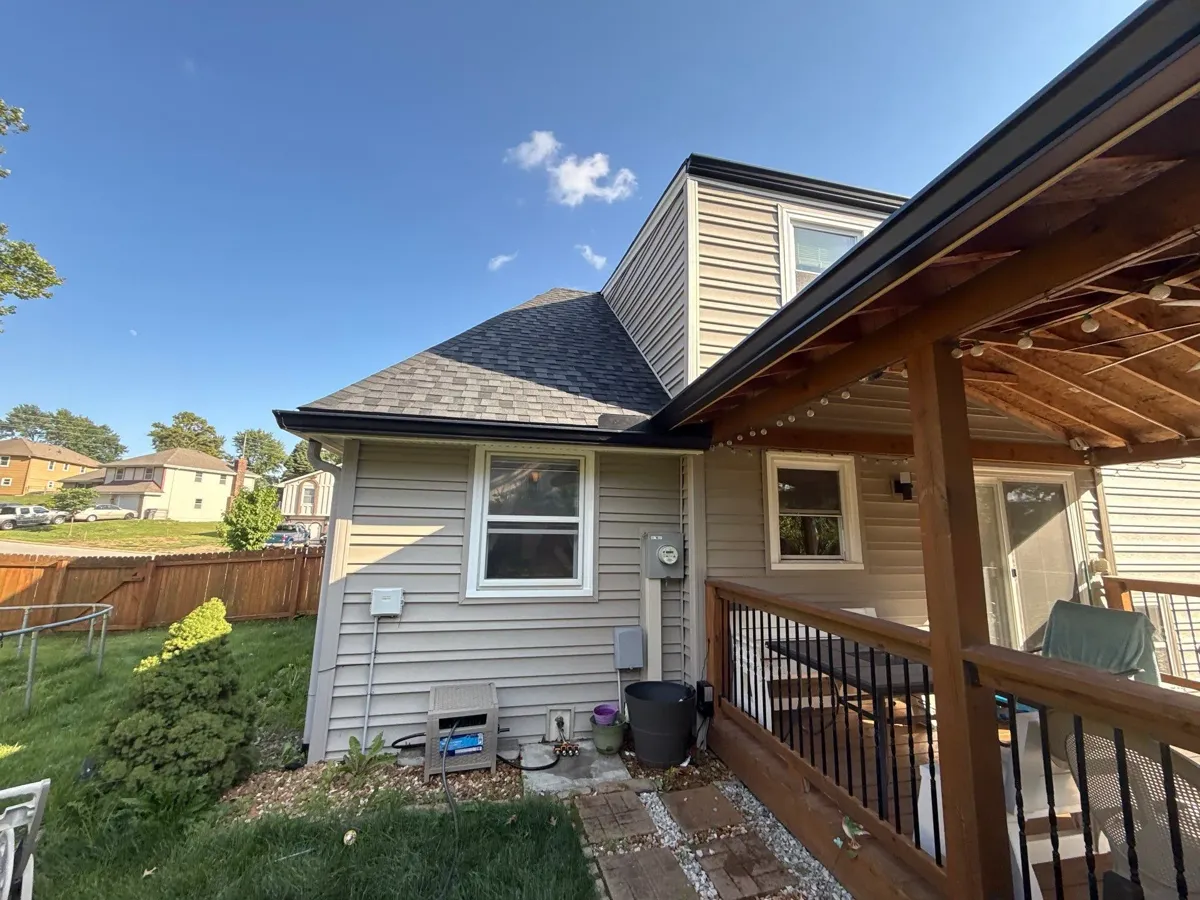 6-inch seamless gutters with Bulldog gutter guards over a covered deck in Parkville, MO