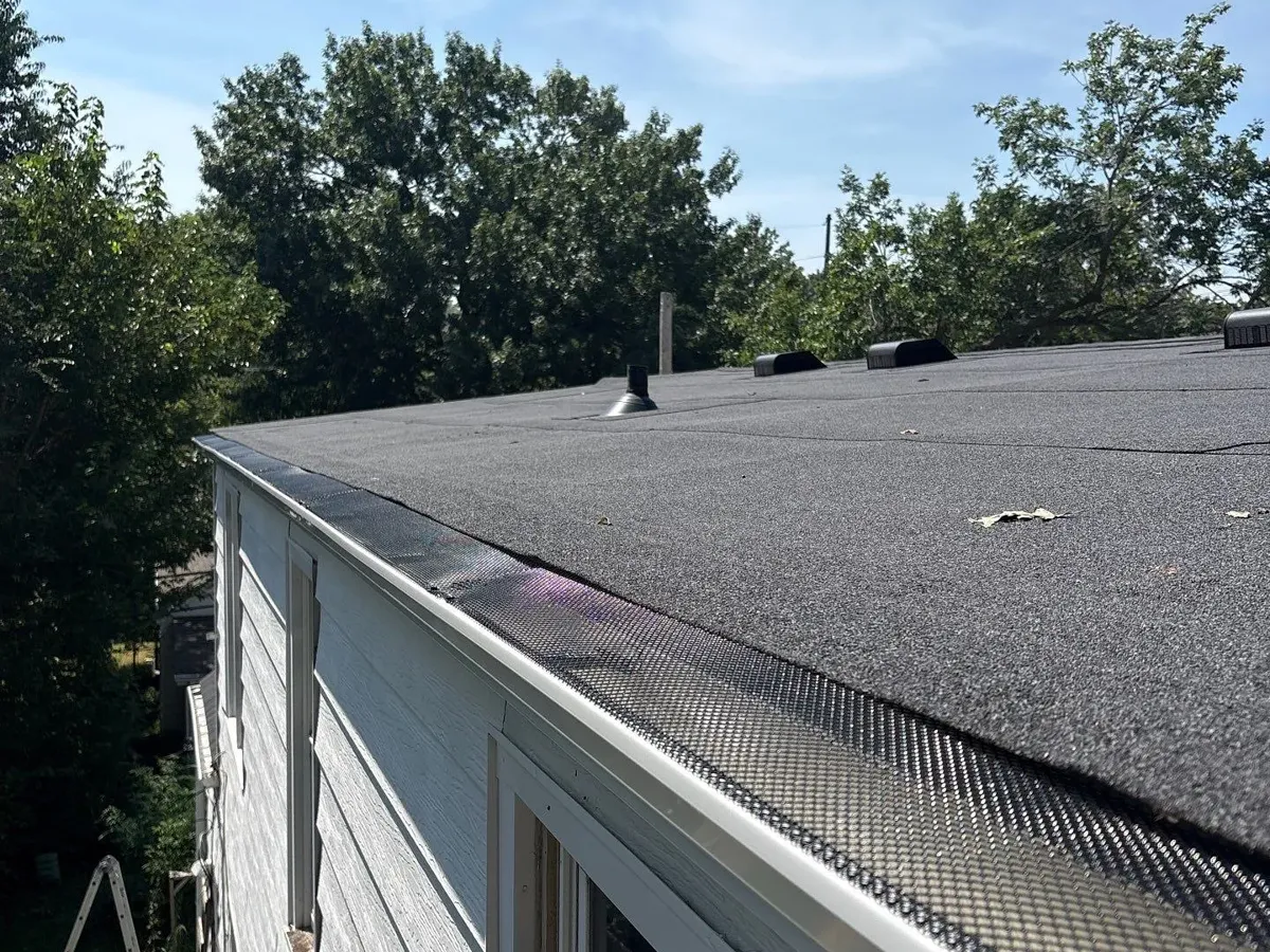 Black mesh gutter guard on a new 5-inch gutter in Roeland Park, KS